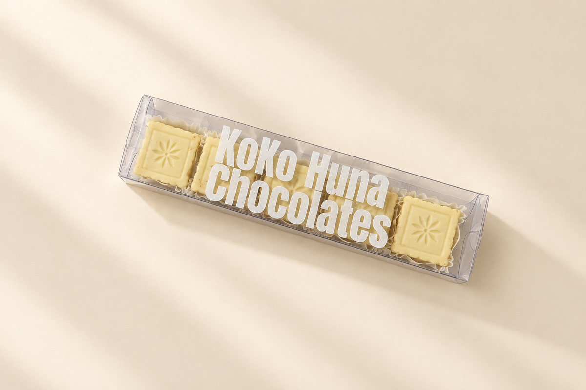 Handmade white chocolate bonbons with coconut and peanut praline by KoKo Huna